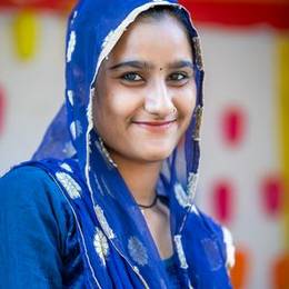 Smiling young Indian woman in a blue dupatta