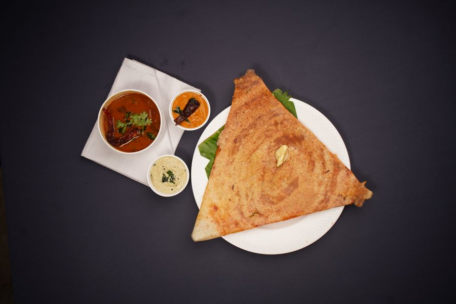 Masala dosa with chutneys and sambar from the live South Indian counter