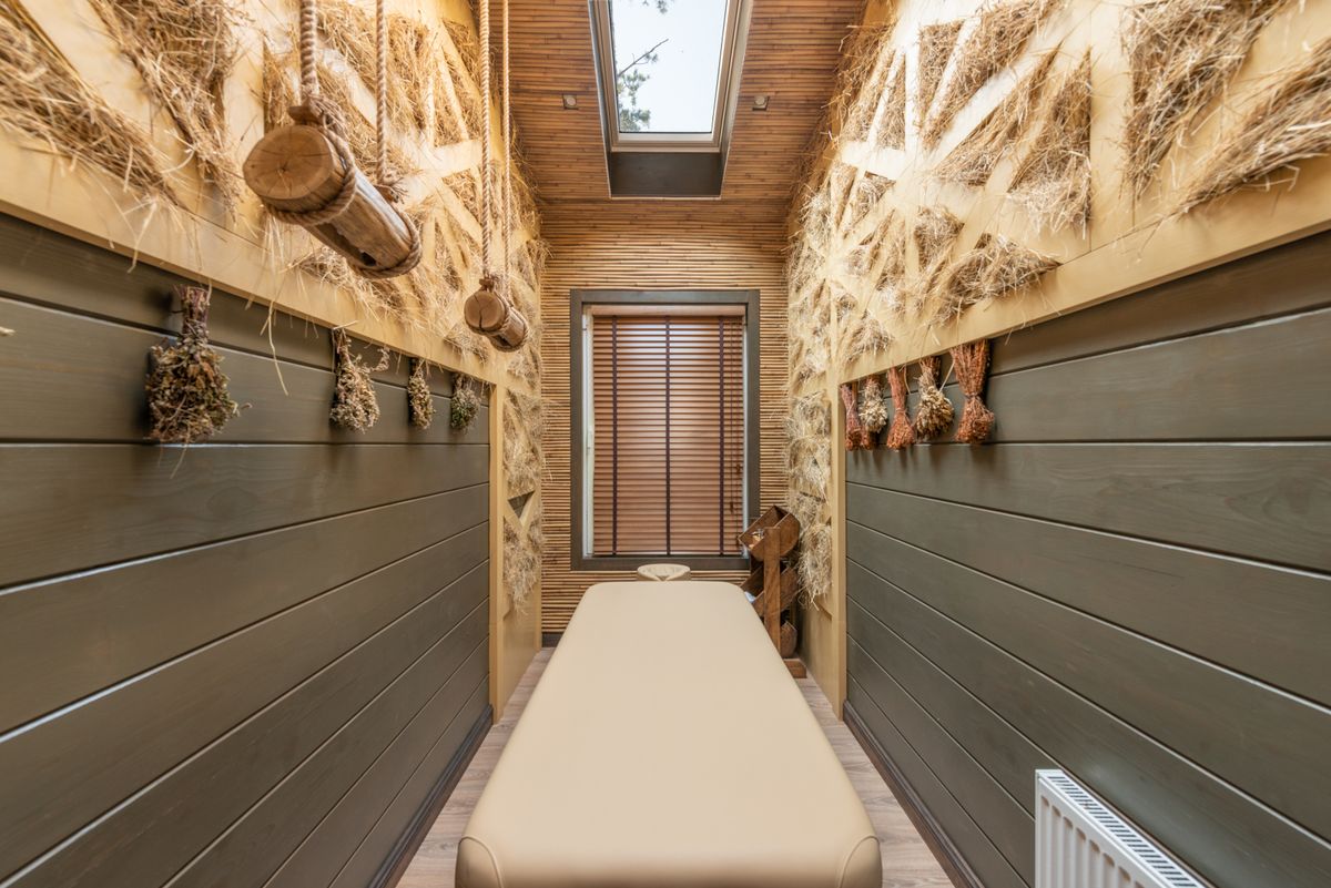 The Kaaya spa suite — a serene treatment room with organic decor