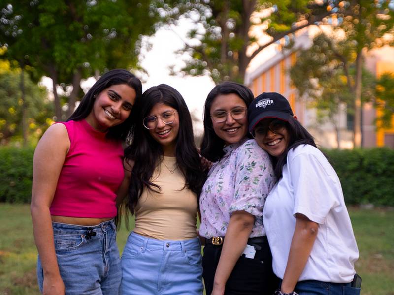 Group of young Indian women laughing together