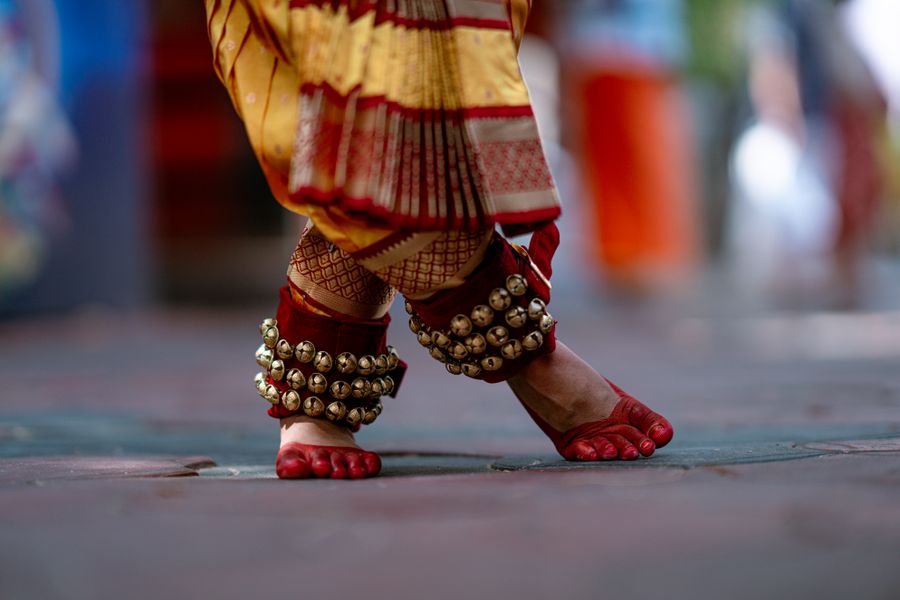 Close-up of a dancer's feet with ghungroo anklets in classical footwork