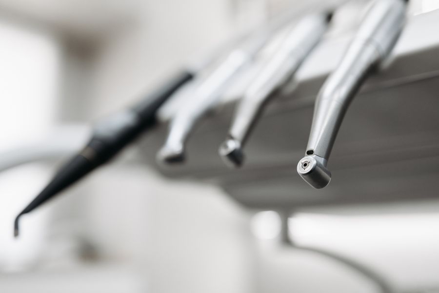 Autoclave-sterilized dental instruments laid out before a procedure