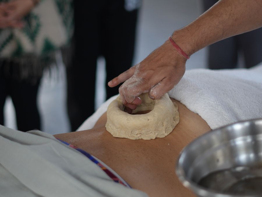A traditional Ayurvedic therapy being administered at the wellness wing