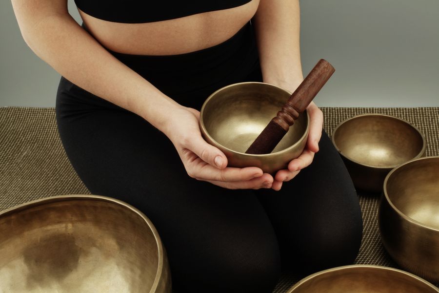 Himalayan singing bowls arranged for a sound healing session