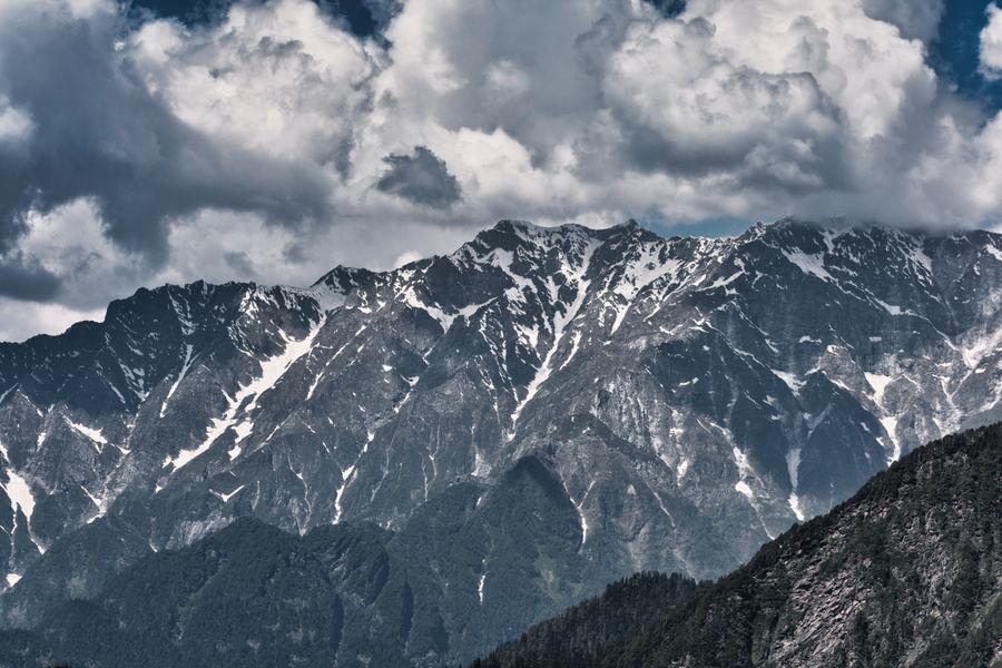 Snow-capped Himalayan peaks under a dramatic sky in Uttarkashi