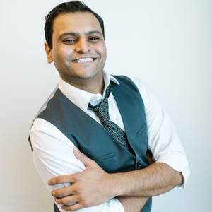 Smiling Indian man in a waistcoat