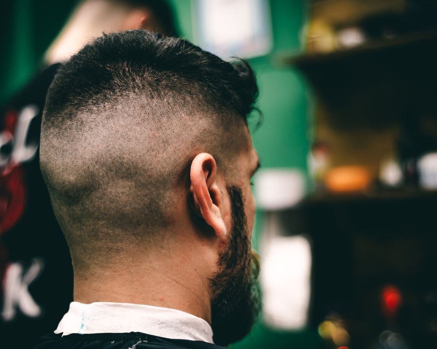 The back of a freshly cut fade haircut at the barbershop